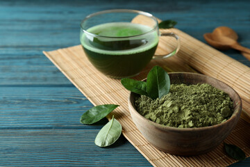 Concept of japanese tea with matcha on blue wooden table