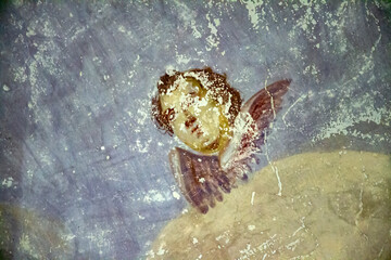 drawings on the walls of an abandoned Orthodox church