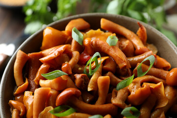 Bowl of marinated mushrooms, close up and selective focus