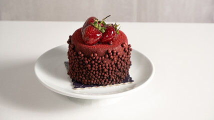 fresh strawberry cake swirling on a white plate