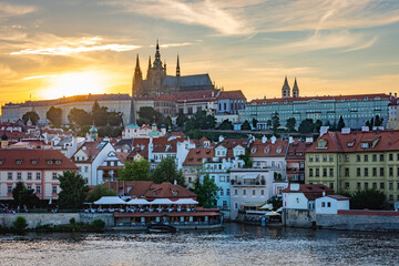 City of Prague by sunset. Prague castle and Vltava river