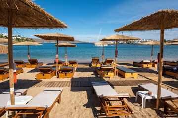 straw umbrellas on the beach at at Puta Zeza beach in Athens in Greece