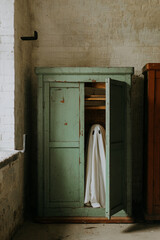 little ghost standing in the closet. Autumn halloween