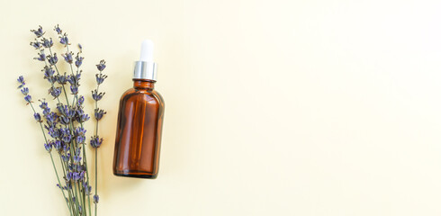 Dropper glass serum bottle of lavender oil top view