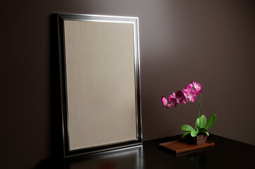 Orchid flower into the light background with a picture frame. 3D rendering