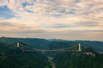 The Aizhai Bridge is a suspension bridge on the G65 Baotou–Maoming Expressway near Jishou, Hunan,...