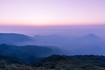 Fototapeta na wymiar Quiet sunrise, Chinese mountain landscape, foggy weather.
