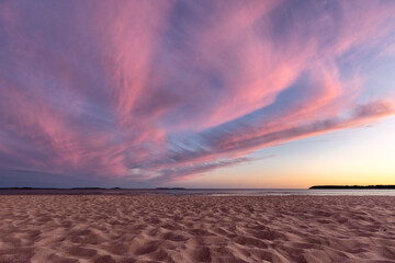 Colorful sunset on the sandy beach in Yyteri