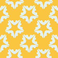 Yellow dewy seamless pattern with white vintage ornaments. Indian floral element. Graphic ornament for wallpaper, fabric, packaging, wrapping.