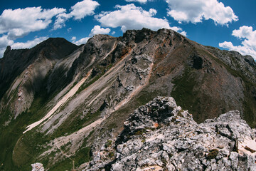 High altitude mountain landscape under blue sky