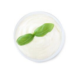 Obraz na płótnie Canvas Delicious sour cream with basil in bowl on white background, top view