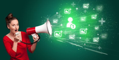 Young person with megaphone and social networking icon