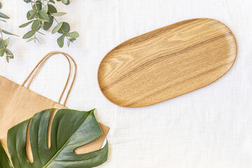 Top view tropical leaves on vibrant background. Summer flat lay composition.