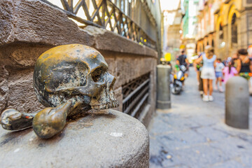 Old bronze skull, detail of the decor on the street in front of the church Purgatorio ad Arco (17th...