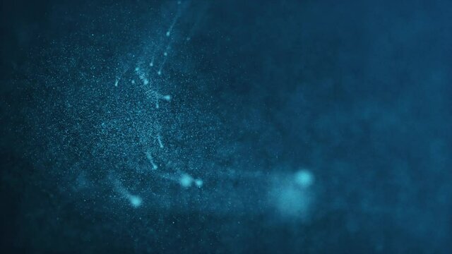 Abstract background with glowing blue energy particles like meteors flowing towards the camera. This motion background animation is full HD and a seamless loop.
