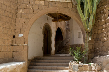 Fototapeta na wymiar n side of The Dar al-Hajar ( Stone House ) in Wadi Dhar . Sana‘a, Yemen