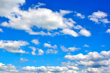 Naklejka na ściany i meble Blue sky background widh white clouds