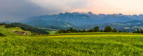 Sunset with a view of the Slovak and Polish Tatra Mountains - obrazy, fototapety, plakaty