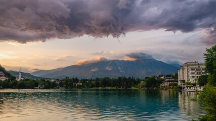 View of the beautiful Lake Bled in Slovenia, Julian Alps and green forests.