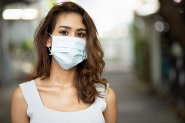 Woman wearing face mask when going outside