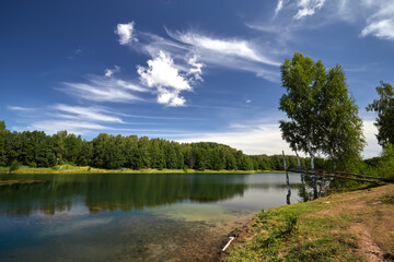 Fototapeta premium Beautiful summer landscape near lake with blue water. Lake Key in the Nizhny Novgorod region.