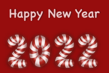 Happy New Year 2022 on a red background. The numbers 2022 are in the form of caramel candies.
