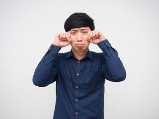 Asian man feeling bad crying hand up at face white background
