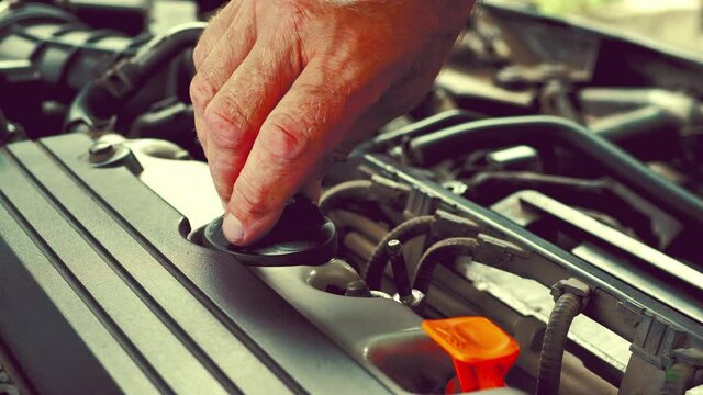 Car engine repair work oil filler cap
unscrew the cover for diagnosing car malfunctions