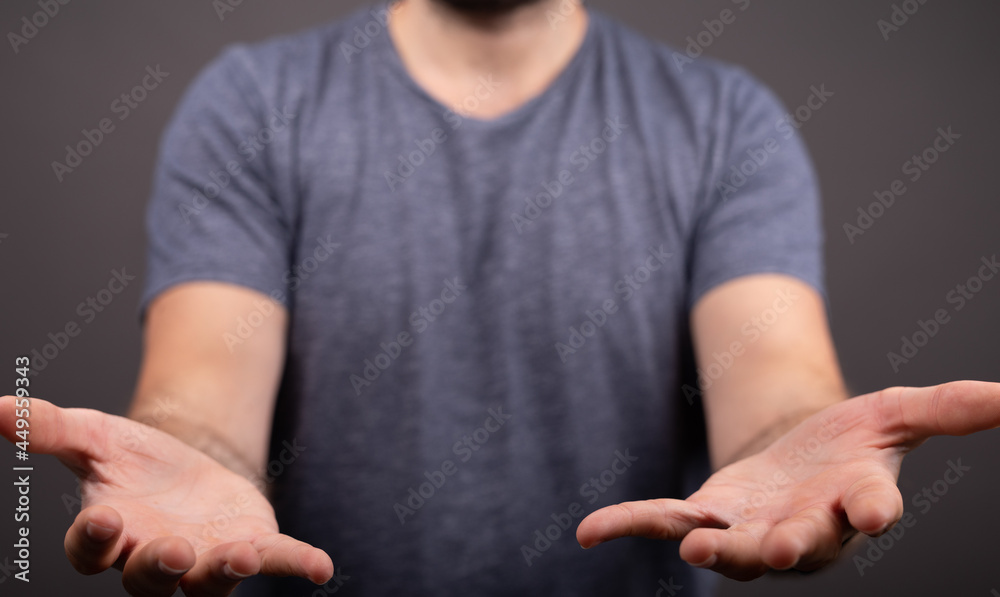 Poster man showing his empty hand.
