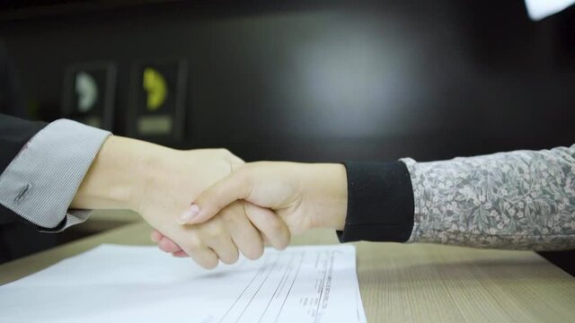 business people shaking hands