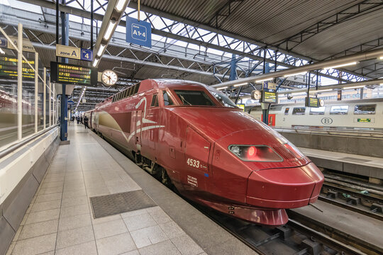 BRUSSELS, BELGIUM - March 12, 2019: International high speed train Thalys arriving in railway station Brussels-South (Bruxelles-Midi or Brussel-Zuid) heading to Amsterdam.