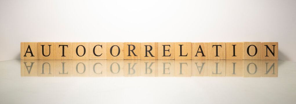 The name autocorrelation was created from wooden letter cubes.