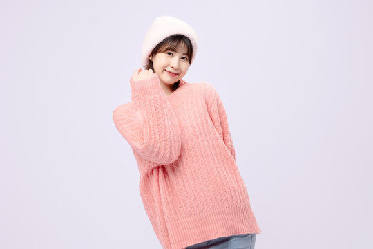 Beautiful Asian Woman In Pink Sweater