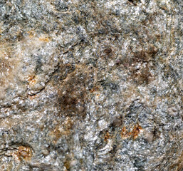 Natural stone macro with a beautiful texture and color create by the wear of time.