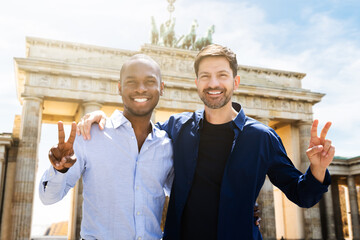 Gay Couple Making Victory Signs © Andrey Popov