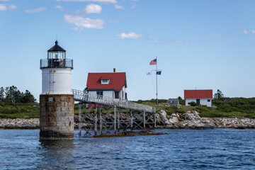 Ram Island Lighthouse near Boothbay Harbor Maine on a sunny summer afternoon
