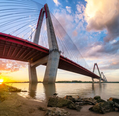 Fototapeta na wymiar The Nhat Tan Bridge is a cable-stayed bridge crossing the Red River in Hanoi,