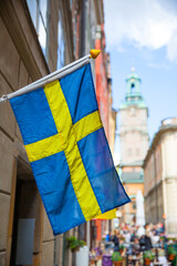Street in Stockholm with swedish flag