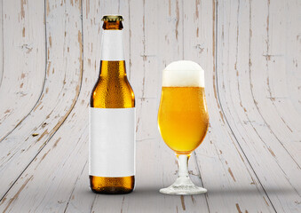 Front view Beer Bottle Mock-Up with glass of session pale ale and foam. Blank Label on wooden...