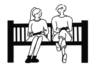 ベンチに座って談笑しているカップル