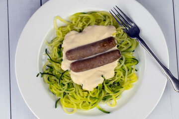 zucchini noodles top with  alfredo sauce