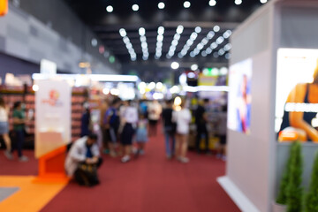Abstract blur people in exhibition hall event trade show expo background. Business convention show,...
