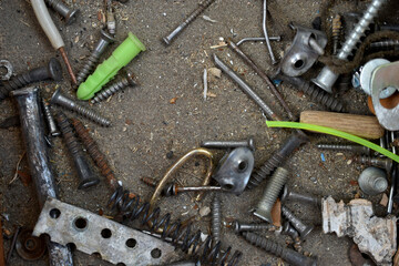 Garbage of tools and bolts and nuts in the drawer