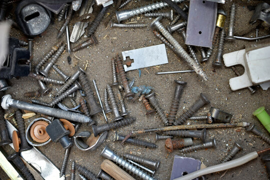 Garbage Of Tools And Bolts And Nuts In The Drawer