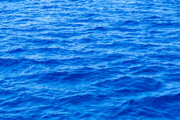 Blue sea waves sunlight