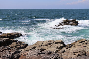 waves crashing on rocks in Brittany 