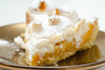 Lemon Meringue Pie, butter enriched shortcrust pastry filled with creamy lemon and topped with meringue