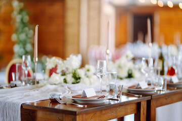 Neatly decorated table for the event. Beautiful serving. Wedding, birthday, party, event concept.