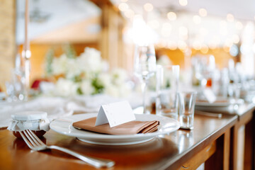 Neatly decorated table for the event. Beautiful serving. Wedding, birthday, party, event concept.