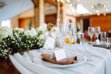Neatly decorated table for the event. Beautiful serving. Wedding, birthday, party, event concept.